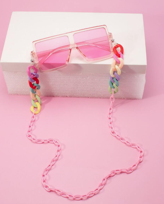 Stylish glasses with colored lenses and a chain for girls