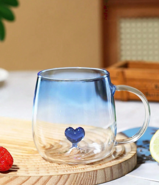 The material is glass, and the cup body has a pink and blue gradient effect, which is beautiful and fashionable.