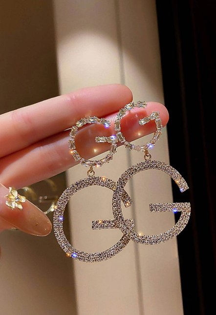 Long earrings with rhinestone letter design