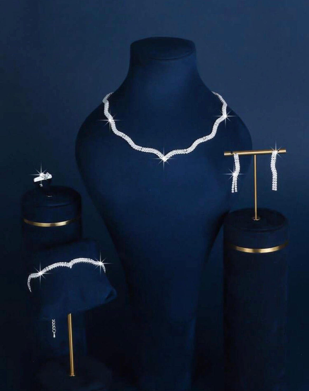 This 4-Piece Bridal Jewelry Set Includes: (1 Crystal Wave Pendant Necklace, 1 Pair Of Earrings, 1 Bracelet, And 1 Ring). Its Light And Elegant Style Is Suitable For Everyday Wear, Weddings, Parties, And Other Occasions.