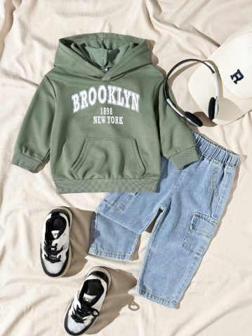 SHEIN Baby/Toddler Tracksuit Set, includes 1 long-sleeved hoodie with a green letter print and pocket, and 1 pair of jeans with an elastic waist and pocket. Suitable for everyday wear, sports, going out, and travel. Sizes from 6 months to 2-3 years.